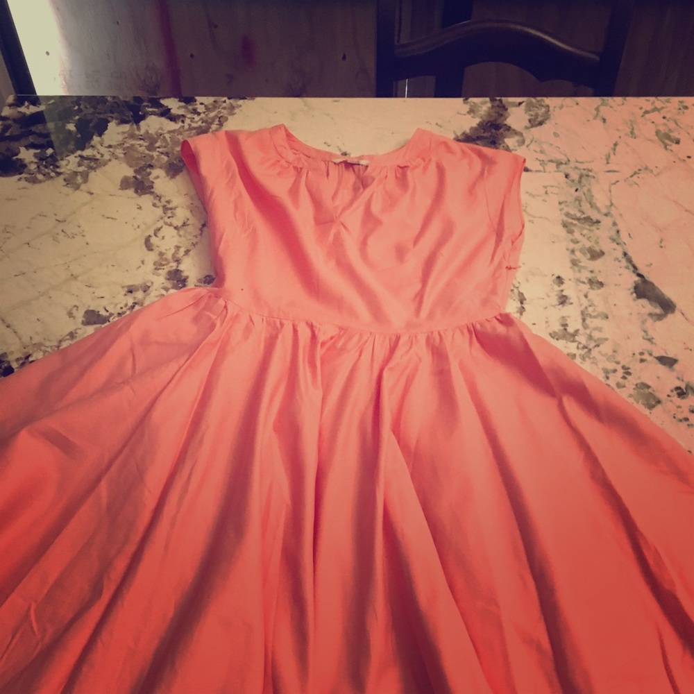 Coral colored knee length dress